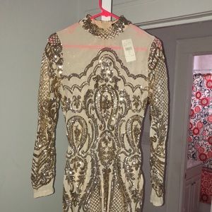 Unworn Sequin dress , stops right above the knees